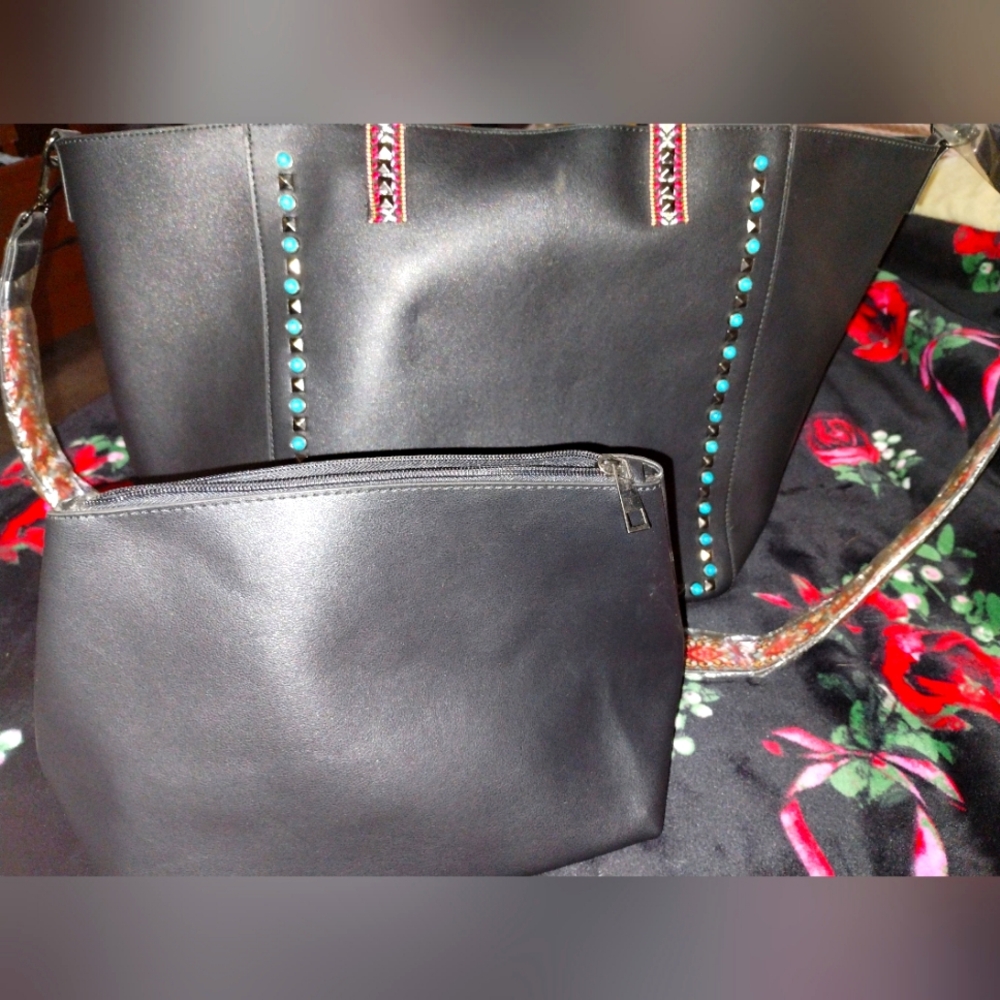 Two piece set black leather tote with long adjustable strap and large makeup bag